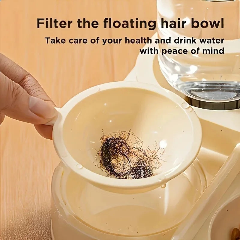 Removable strainer lifting floating hair out of the water bowl